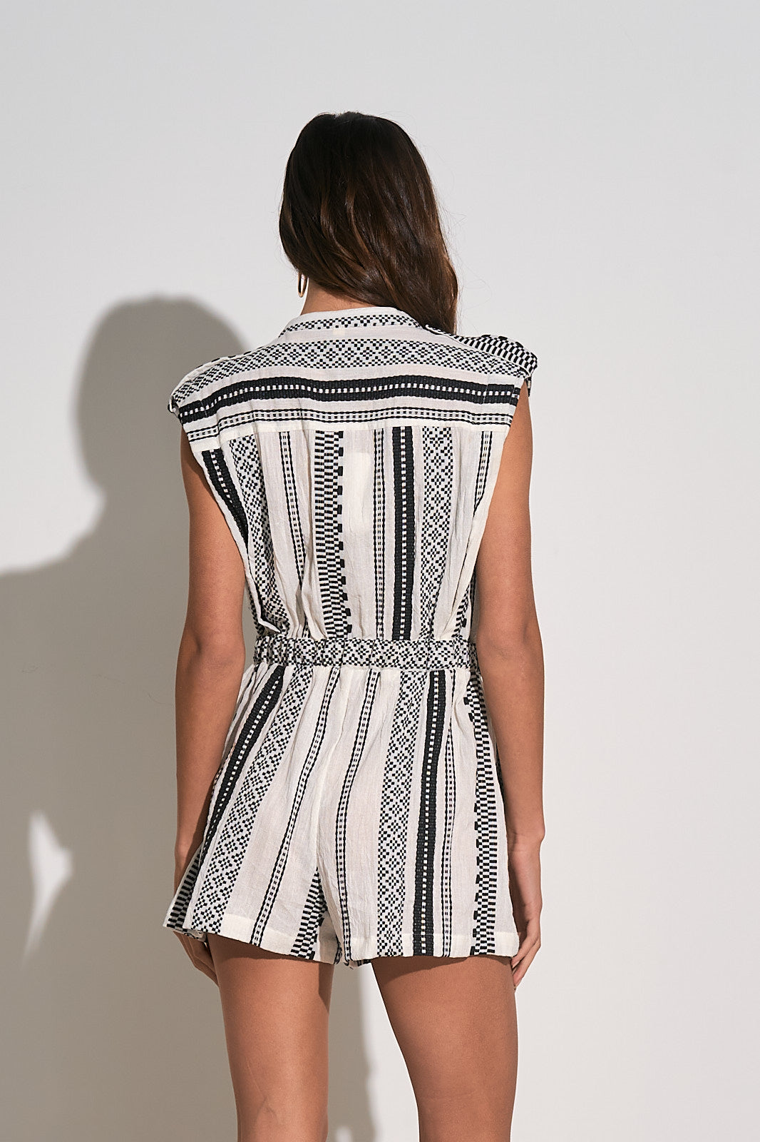 Sleeveless button down romper